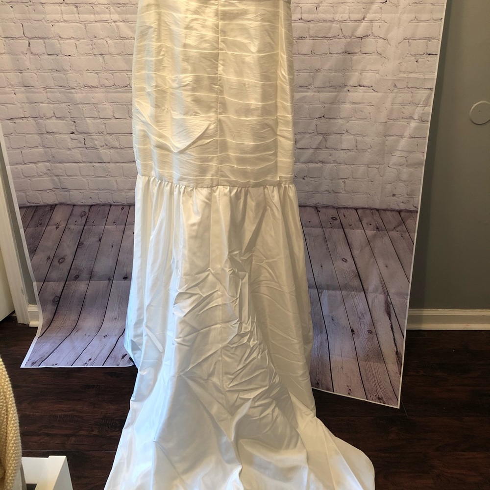 Strapless wedding dress with a train